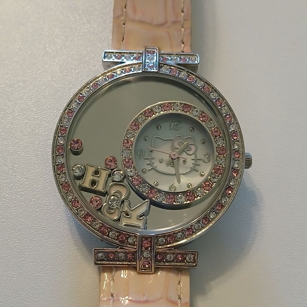Sanrio Hello Kitty Women Rhinestone Floating Charm Pink Leather Strap Watch 40mm